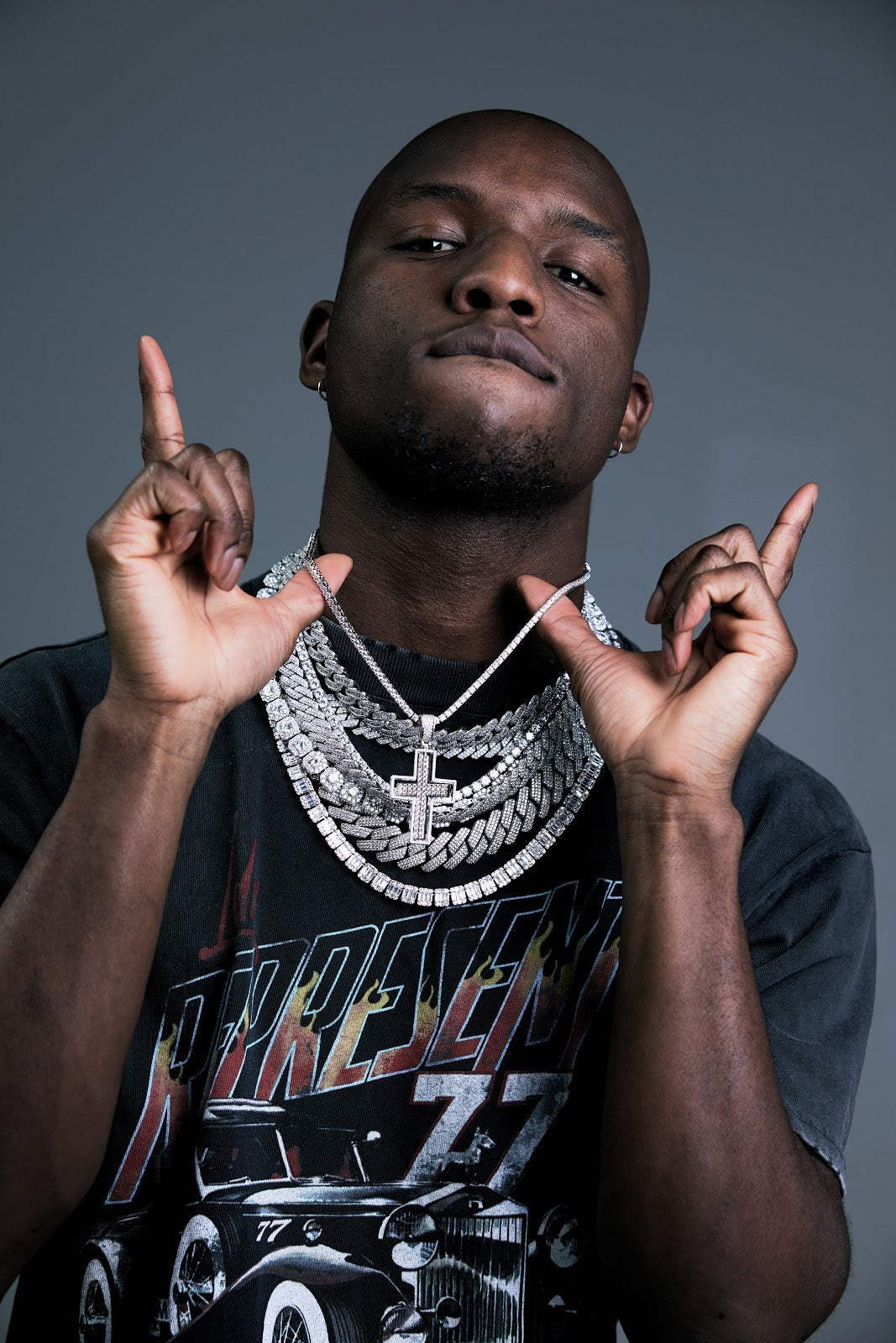 The Meaning and History Behind the Diamond Cross Pendant